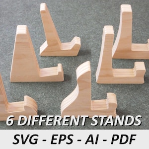 May include: Six unfinished wooden display stands in various shapes. The stands are light-coloured and appear to be made of pine or a similar wood. Text at the bottom reads "6 DIFFERENT STANDS" and "SVG - EPS - AI - PDF".