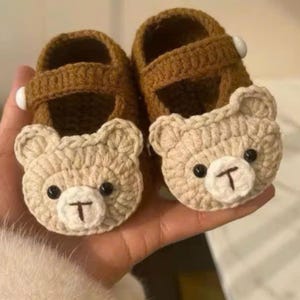 Handmade crochet baby shoes with cute teddy bear design, perfect soft newborn booties gift