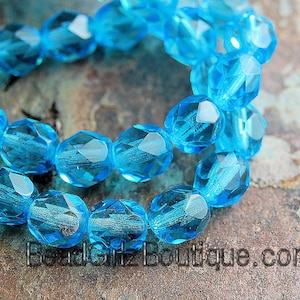 Aquamarine Blue Czech Faceted Glass Bead 4mm Round - 50 Pc
