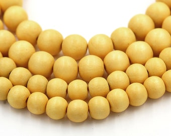 Yellow Round Natural Wood Beads 8mm Large Hole 16 Inch Strand Yellow Round Natural Wood Beads 8mm Large Hole 16 Inch Strand