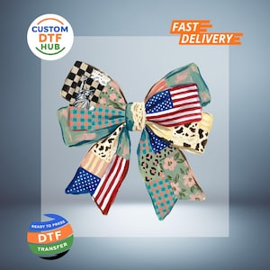 May include: A large, decorative bow with a patchwork design featuring the American flag, floral patterns, and checkered prints. The bow has a cream-colored center and is labeled with "Custom DTF Hub" and "Ready to Press DTF Transfer."