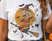 Unisex Witch T-Shirt | Retro Halloween Print | Flying Broomstick Graphic Tee | Vintage Witch T-Shirt