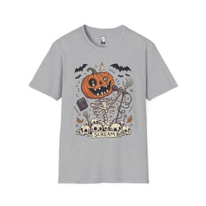Scream Skeleton Halloween Shirt | Pumpkin Rocker T-shirt | Metal Horror Tee | Retro Herfstconcert Top | Gothic Rock Kleding | Unisex Cadeau Sport Grey