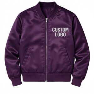May include: A purple satin bomber jacket with a silver zipper and two front pockets. The text "CUSTOM LOGO" is printed in white on the chest. The jacket has ribbed cuffs and hem.