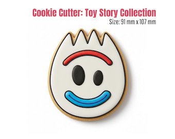 May include: A cookie cutter in the shape of the Toy Story character Forky. The cookie cutter has a white face with black oval eyes, a red curved line above the eyes, and a blue curved line for a smile. The cookie cutter is 91 mm x 107 mm.