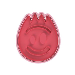 May include: A red plastic cookie cutter in the shape of a smiling face with a flame-like top. The cutter has a smooth, rounded shape with a thin white outline.