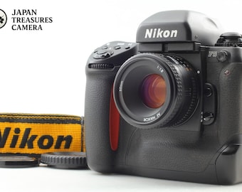 Fotocamera reflex Nikon F5 35 mm AF con obiettivo 50 mm f1.8, nuova, in condizioni perfette, con tracolla*, proveniente dal Giappone.