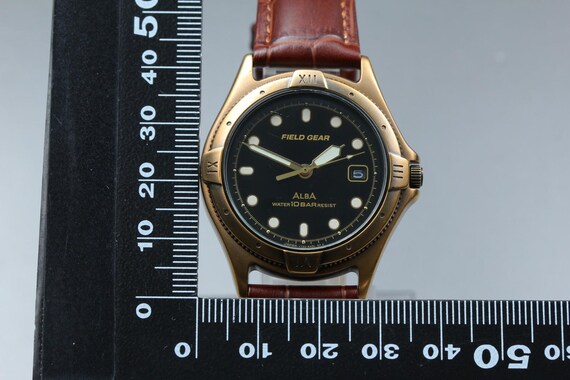 Vintage 2000 seiko alba field gear v722-6a00 black di… - Gem