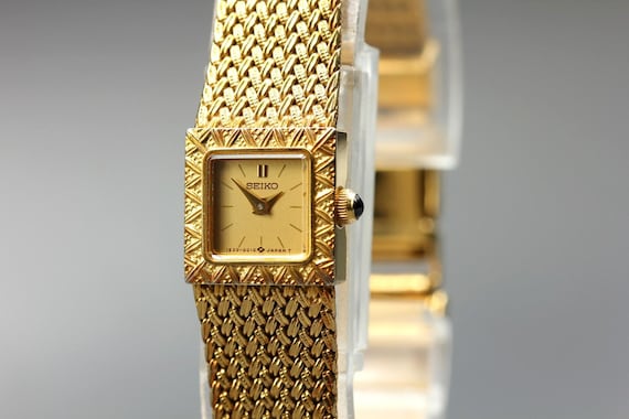 Vintage 1993 *near mint* seiko 1e20-5000 13mm gold sq… - Gem