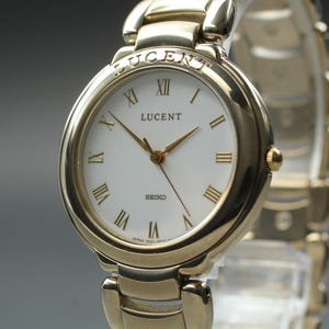 Vintage1992 *n mint* seiko lucent 7n01-6450 gold roman quartz womens watch japan