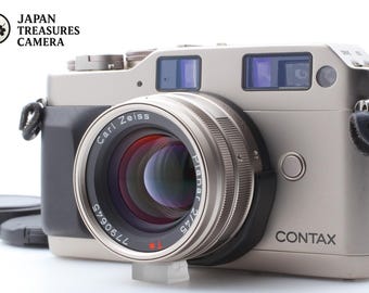 Fotocamera a pellicola Contax G1 35 mm con etichetta verde *exc+5* e obiettivo Planar 45 mm f2 proveniente dal Giappone.