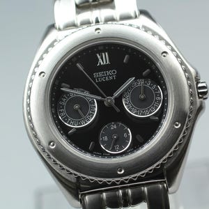 1995 *mint* seiko lucent 5y89-0a40 black triple calendar qz mens vintage watch