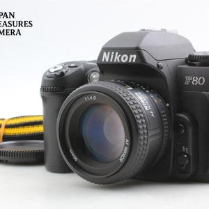 Appareil photo argentique Nikon F80 35 mm avec objectif AF Nikkor 50 mm f/1.4D – État neuf