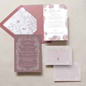 May include: A set of wedding stationery in shades of mauve and white. The invitation features floral illustrations and elegant typography. Includes an invitation, details card, RSVP card, and envelope.