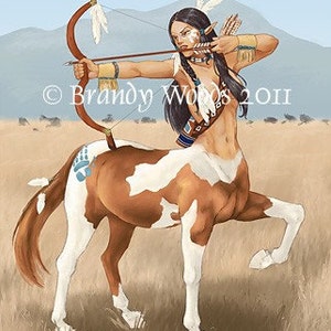 May include: A Native American-inspired centaur woman with brown and white fur, holding a bow and arrow, aiming at something off-screen. She is wearing a feathered headdress and a beaded necklace. The background is a grassy field with a mountain range in the distance. The image is signed "Brandy Woods 2011".