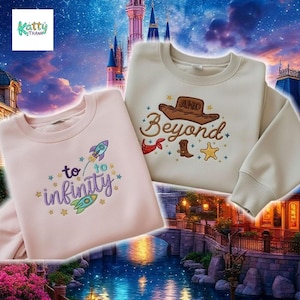 two sweatshirts with embroidered designs, set against a backdrop of a castle and a starry night sky.