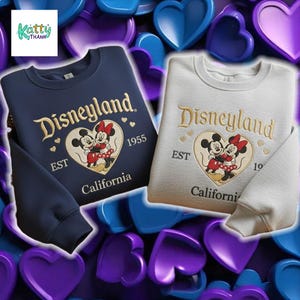 two sweatshirts with the Disney theme park logo, Minnie Mouse and Mickey Mouse, against a background of hearts in various colors.