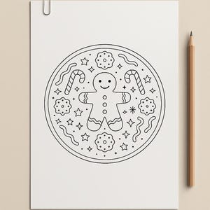 May include: Black and white line art illustration of a gingerbread man, candy canes, cookies, stars, and squiggly lines arranged in a circle. The image is on a white sheet of paper with a paper clip and a pencil.