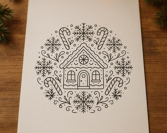 Puede incluir: Una tarjeta blanca con un dibujo lineal negro de una casa de jengibre, copos de nieve y bastones de caramelo dispuestos en un diseño circular. La tarjeta está sobre una superficie de madera, con vegetación en las esquinas.