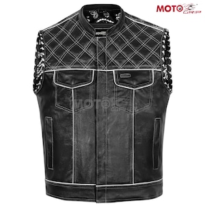 May include: A black leather vest featuring a mandarin collar, a diamond-quilted upper chest panel with white stitching, two chest pockets with flaps, and two lower vertical pockets. The interior lining displays a black and white paisley pattern.