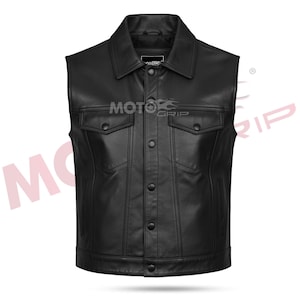 May include: Black leather vest with a collared neckline, two chest pockets, and a button-up front. The vest has a tailored fit and a classic design. The brand name "MOTO GRIP" is visible on the vest.
