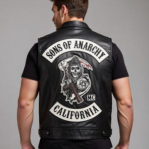 May include: Black leather vest with the "Sons of Anarchy" logo patch on the back. The patch features a grim reaper with a scythe and a gun, along with the text "California" and "MC".