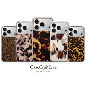 May include: Five rectangular phone cases arranged in a row, each featuring a distinct tortoiseshell or animal-inspired pattern in shades of brown, black, cream, and amber. The text CaseCraftEska PHONE CASE is centered below the phone cases.