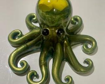 Green octopus with rubber ducks