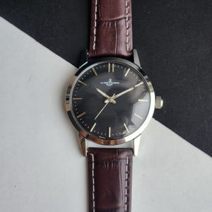 Vintage Ulysse Nardin Handaufzug Herrenuhr Schwarzes Ziffernblatt 35 mm Braunes Krokolederband