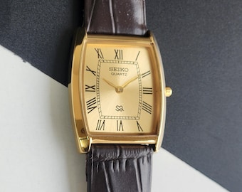 Vintage Refurbished Seiko Slim Quartz Golden Face 26MM Rectangular Men's Watch