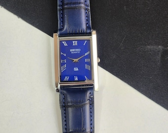 Odnowiony, zabytkowy zegarek męski Seiko Slim Quartz z niebieską tarczą, 26 mm, prostokątny