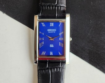 Odnowiony, zabytkowy zegarek męski Seiko Slim Quartz z niebieską tarczą, 26 mm, prostokątny