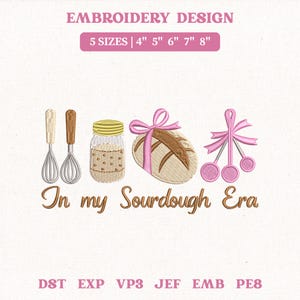 May include: An embroidery design featuring kitchen tools, a jar, a loaf of bread with a pink bow, and a pink cherry blossom design. The text "In my Sourdough Era" is below the images. The design is available in 5 sizes: 10cm, 13cm, 15cm, 18cm, and 20cm.