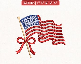 May include: Embroidery design of the American flag with red and white stripes and a blue field of stars. The flag is on a wooden pole with a red bow. Text reads "EMBROIDERY DESIGN" and "5 SIZES | 4" 5" 6" 7" 8""