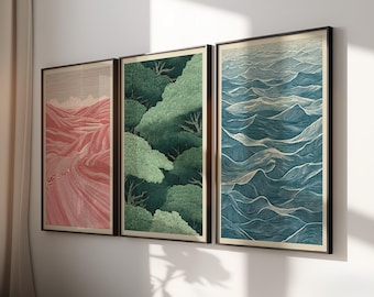 Peut inclure: Trois impressions d'art encadrées. La première représente un paysage rouge et rose avec un chemin sinueux. La seconde montre une forêt verte. La troisième présente des vagues bleues et blanches. Le tout est dans des cadres noirs.