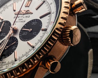 Pilot's Rose Gold Navitimer Chronograph Silver Face Slide Rule Bezel