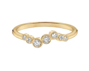 7 Glossy Round Bezel Set Diamonds. Featuring a Total of 0.20 Ct Diamond Ring