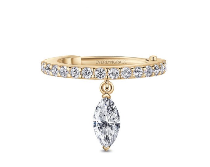 8mm diameter ear clicker, inlaid with round cut stones and a marquise cut pendant, suitable for piercings such as lobe , conch, and helix .