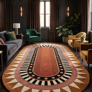 May include: An oval area rug featuring a central rust-colored panel with thin vertical lines, surrounded by a black border with pink dots, a pink band, and an outer edge decorated with a repeating pattern of white triangles on a rust background.