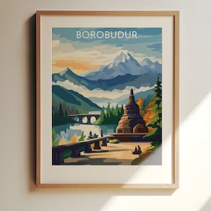 Könnte beinhalten: Gerahmter Kunstdruck mit einer Landschaftsszene von Borobudur. Das Kunstwerk zeigt eine braune Stupa, Berge, einen See und eine Brücke. Der Himmel ist blau und orange, und der Druck ist in einem Holzrahmen.