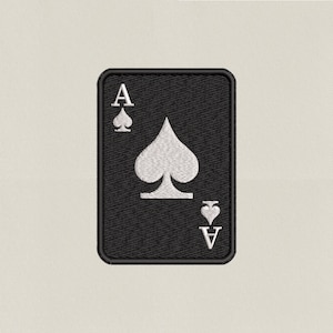 May include: Black embroidered patch of the Ace of Spades playing card. The card features a white spade symbol and the letter "A" at the top and bottom, with a spade symbol next to each "A". The patch has a black border.