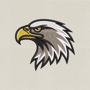 May include: Embroidered eagle head with a yellow beak and eye, gray and white feathers, and black outlines. The eagle is facing left against a light beige background. This design is suitable for patches, apparel, or other crafts.
