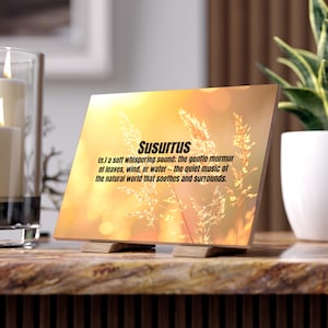 May include: A set of three ceramic mugs with a speckled, matte finish. The mugs are in cream, light grey, and dark grey. Each mug has a simple, minimalist design, ideal for coffee or tea.