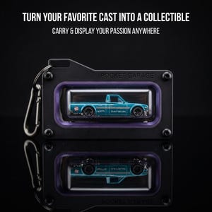 May include: A black rectangular keychain case labeled POCKET GARAGE with a purple inner frame, containing a miniature teal Datsun pickup truck toy. The text TURN YOUR FAVORITE CAST INTO A COLLECTIBLE and CARRY & DISPLAY YOUR PASSION ANYWHERE appears above.