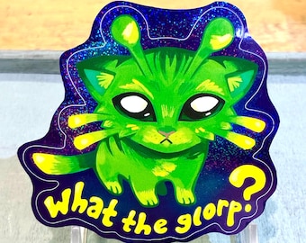 May include: A green alien cat sticker with large white eyes, yellow antennae, and a question mark. The sticker has a dark blue and purple background with the words "what the glorp?" in yellow.
