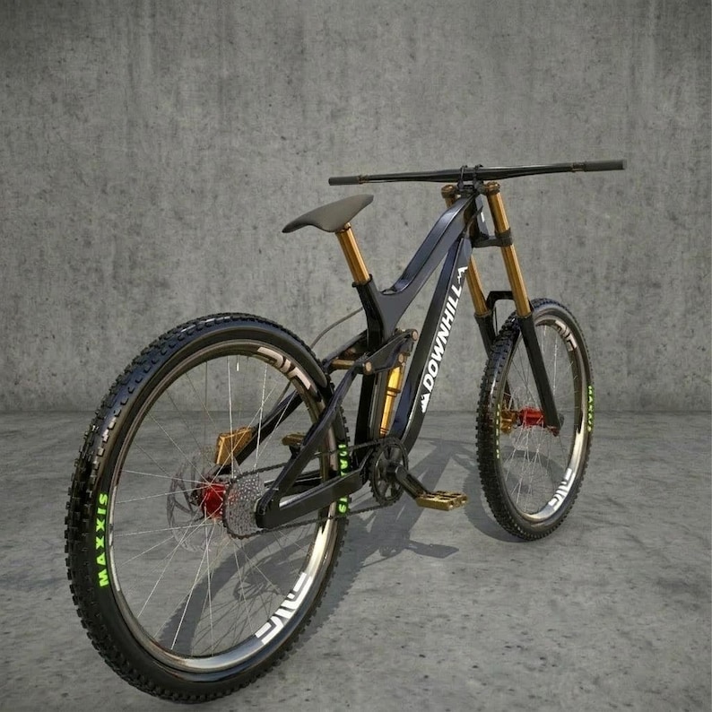 May include: A black and gold downhill mountain bike with "DOWN HILL" text on the frame. The bike has large tires with green lettering, a black seat, and gold suspension components. The bike is angled to the left.