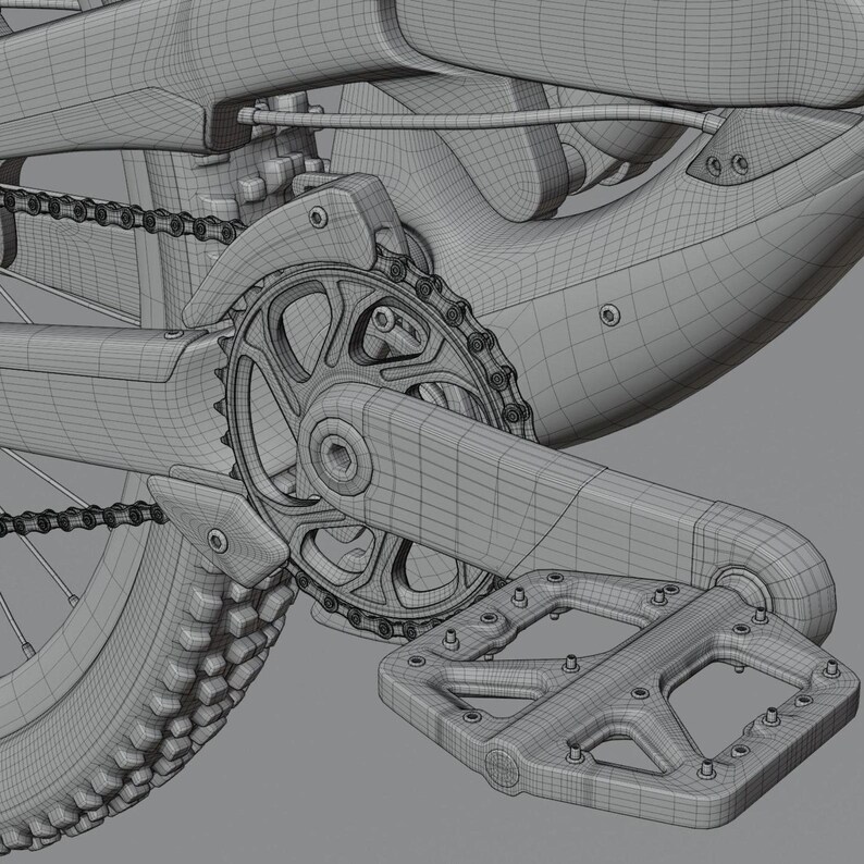 May include: Close-up of a bicycle's drivetrain, showcasing the chain, gears, and pedal. The image highlights the mechanical components, with a focus on the intricate design of the chainring and the textured surface of the tire. The color is a neutral gray.