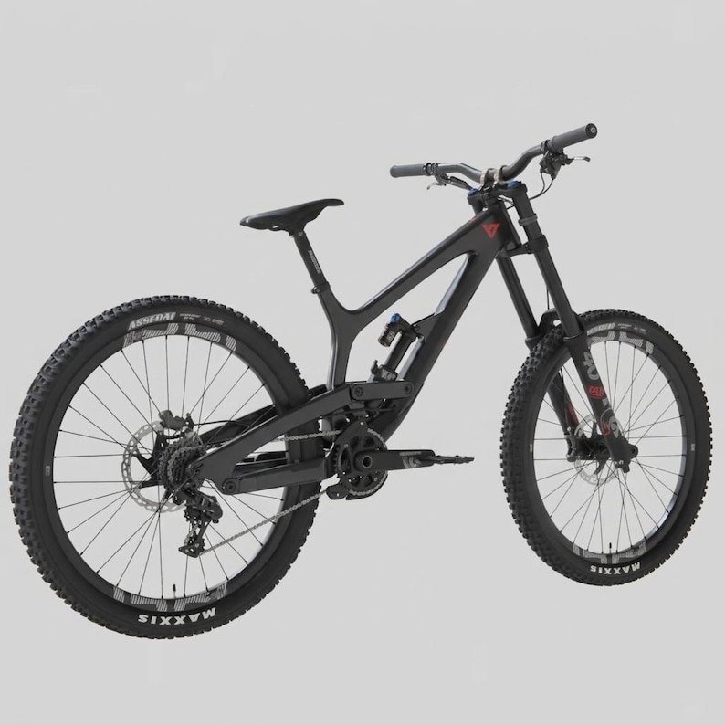 May include: A black mountain bike with thick tires and a suspension system. The bike has a sleek, modern design with a black frame, handlebars, and seat. The wheels have the brand name "Maxxis" on the tires.