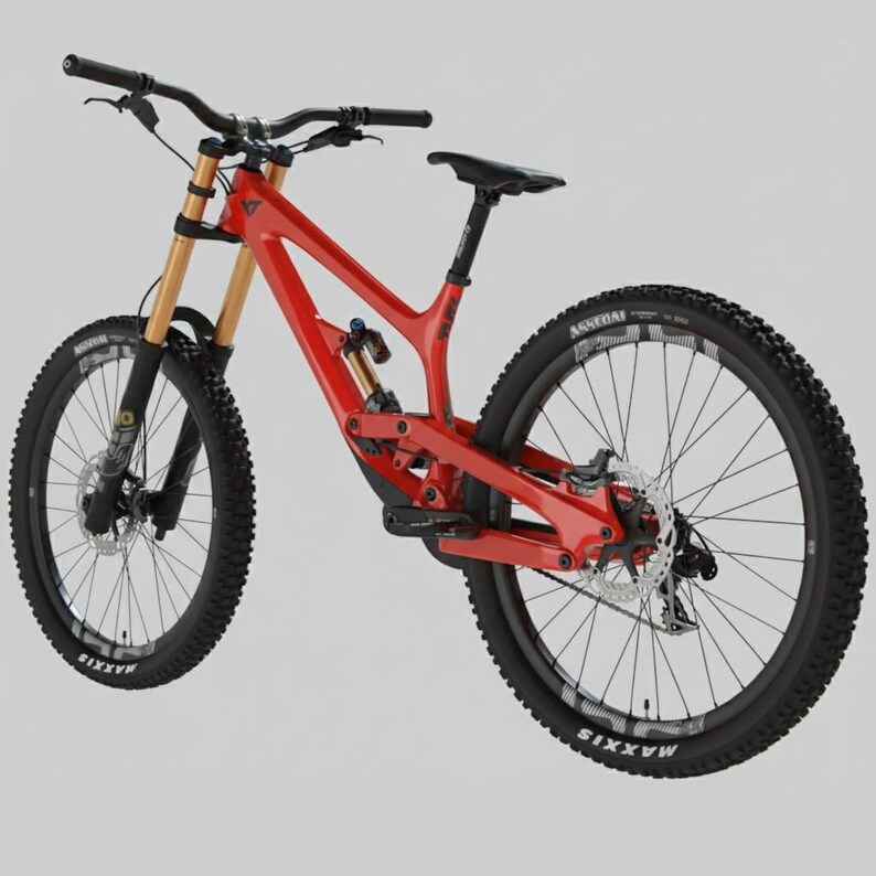 May include: A red mountain bike with black tires and components. The bike features a suspension system, disc brakes, and a black seat. The tires have the brand name "Maxxis" on the sidewalls. The frame is a vibrant red color.