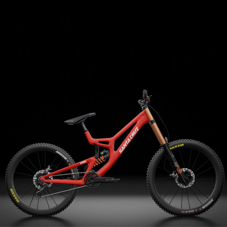 May include: A red Santa Cruz mountain bike with black tires and a black seat. The bike has gold-colored suspension components and the brand name is displayed on the frame. The tires have the Maxxis logo.
